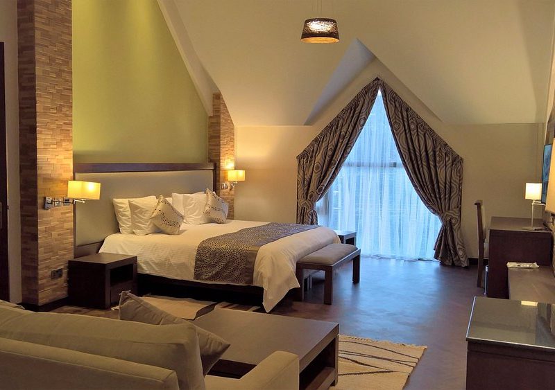 Magna Hotel & Suites